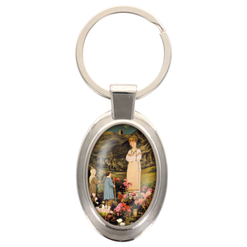 Porte-clés en métal de couleur argenté de forme ovale H. 4.3 cm. Livré en boite cadeaux. Existe avec différents Saints.