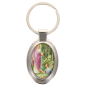 Porte-clés en métal de couleur argenté de forme ovale H. 4.3 cm. Livré en boite cadeaux. Existe avec différents Saints.