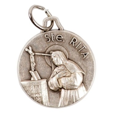 Médaille moulée ou frappée en métal couleur argentée Ø 1.8 cm. Plusieurs saints.