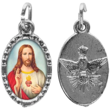 Médaille ovale métal argenté, rebord torsadé, résine. H : 1,5 cm. Différents Saints disponibles.
