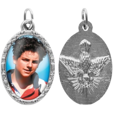 Médaille ovale métal argenté, rebord torsadé, résine. H : 2,5 cm. Différents Saints disponibles.