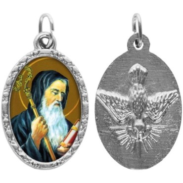 Médaille ovale métal argenté, rebord torsadé, résine. H : 2,5 cm. Différents Saints disponibles.
