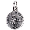 Médaille moulée en métal couleur argentée Ø 1.2 cm. Plusieurs Saints.