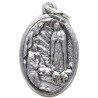Médaille en métal couleur argentée forme ovale H. 2,2 cm. Plusieurs saints.