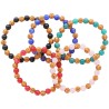 Bracelet sur elastique grains plastique imitation bois et couleur assortie Ø 7 mm. LOT DE 10.