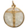 Pendentif en coquille naturelle avec Christ en croix au centre en laiton dore Ø 1,5 cm..