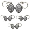 Porte-clés H. 4.5 cm en métal couleur argentée forme ovale double face, plusieurs saints..