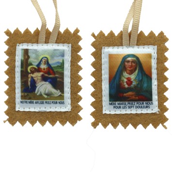 Scapulaire en tissus des 7 douleurs avec explications H. 4,5 x 5 cm. Livre en sachet individuel..