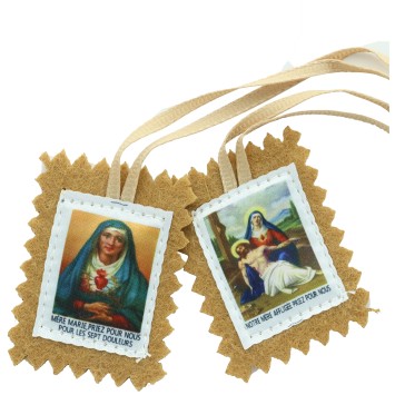 Scapulaire en tissus des 7 douleurs avec explications H. 4,5 x 5 cm. Livre en sachet individuel..