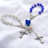 Dizainier sur chaine grains Ø 5 mm et rose, croix metal avec Christ. Disponible en differentes couleurs..