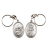Porte-clés H. 3,7 cm en métal couleur argentée forme ovale double face, plusieurs saints..