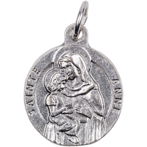 Medaille moulee ou frappee en metal couleur argentee Ø 1.8 cm. Plusieurs saints.