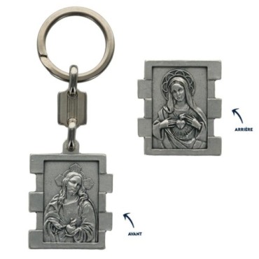 Portes clés en zamac de forme rectangulaire, hauteur 3.5 cm. Existe en différents Saints.