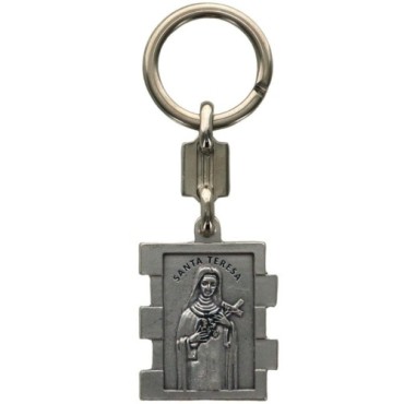 Portes clés en zamac de forme rectangulaire, hauteur 3.5 cm. Existe en différents Saints.