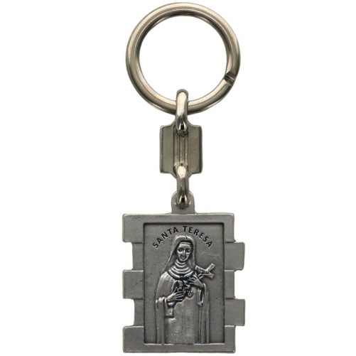 Portes clés en zamac de forme rectangulaire, hauteur 3.5 cm. Existe en différents Saints.