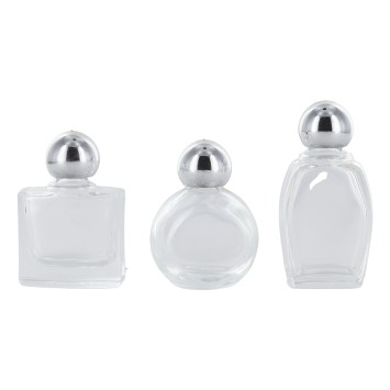 Bouteille en verre H. 4,5 cm forme selon arrivage.