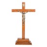 Crucifix bois marron vernis avec Christ métal bronzé sur socle