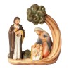 Nativité avec arbre en résine de couleur H. 7 cm.