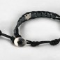 Bracelet dizainier ajustable sur corde de couleur noire avec grains carrés en hématite et croix en métal..