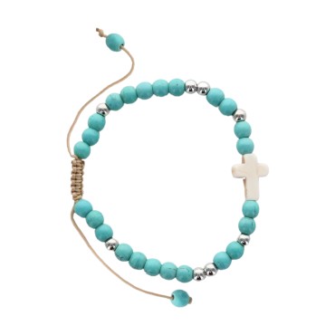 Bracelet sur corde grains turquoise synthetique Ø 5 mm et croix en magnesite synthetique..