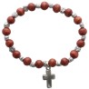 Bracelet sur élastique grains bois et métal forme rose. Differentes couleurs..