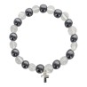 Bracelet sur elastique en hematite et pierre naturelle ou synthetique Ø 7 mm avec croix..
