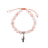 Bracelet sur corde reglable en pierre naturelle ou synthetique Ø 8 mm avec croix metal.