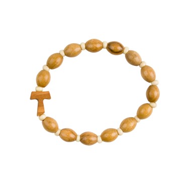 Bracelet sur élastique grains bois ovale Ø 6 mm, avec croix de Taux.