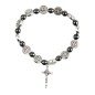 Bracelet sur élastique avec médailles de saint Benoit et grains hématite Ø 9 mm, avec croix de saint Benoit.