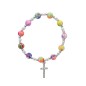 Bracelet sur elastique grains gomme multicolores Ø 8 mm, avec croix metal.