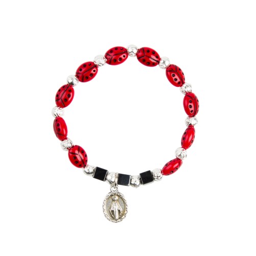 Bracelet sur élastique pour enfant, grains coccinelle 6 x 8 mm avec médaille V Miraculeuse.