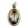 Médaille métal couleur dorée ovale H. 2,5 cm avec résine, plusieurs saints.