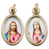 Médaille métal couleur dorée ovale H. 2,5 cm avec résine, plusieurs saints.
