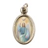 Médaille métal couleur dorée ovale H. 2,5 cm avec résine, plusieurs saints.