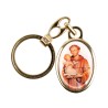 Porte-cles en metal couleur doree H. 3,8 cm avec resine couleur des saints.