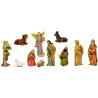 Crèche en résine 11 personnages, H.6 cm. Livrée en boite présentoir.