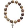 Bracelet sur elastique grains oeil de tigre Ø 10 mm et perle strass, avec croix metal..