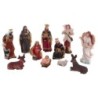Crèche en résine de 11 personnages, H. 8.5 cm. Livrée en boite présentoir.