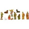 Crèche en résine 11 personnages, H.6 cm. Livrée en boite présentoir.