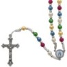 Chapelet sur corde grains ronds multicolores 5 mm, longueur jusqu'au cœur 28 cm, cœur résine Croix avec Christ en métal.