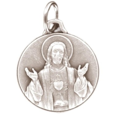 Médaille moulée ou frappée en métal couleur argentée Ø 1.5 cm. Plusieurs saints..