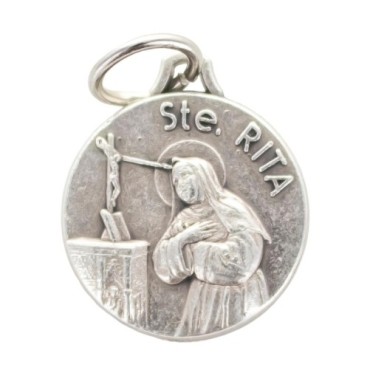 Médaille moulée ou frappée en métal couleur argentée Ø 1.5 cm. Plusieurs saints..