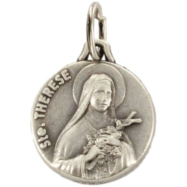Médaille moulée ou frappée en métal couleur argentée Ø 1.5 cm. Plusieurs saints..