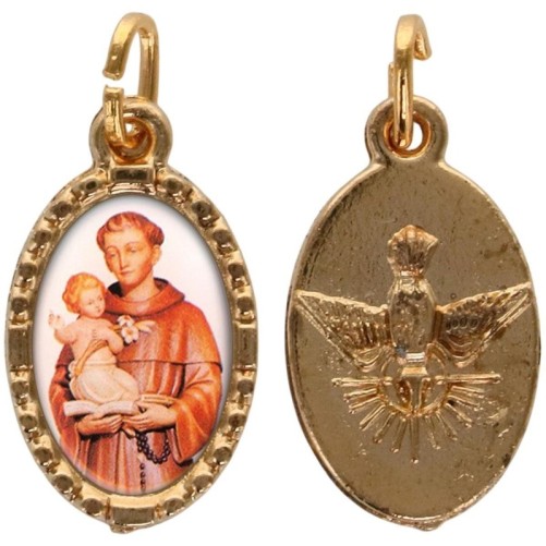 Médaille métal de couleur dorée ovale avec rebord effet dentelle H.1.5 cm avec résine. Disponible avec différents Saints.