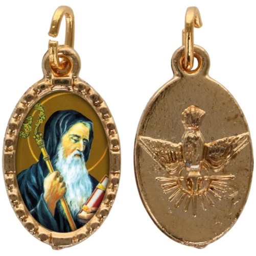 Médaille métal de couleur dorée ovale avec rebord effet dentelle H.1.5 cm avec résine. Disponible avec différents Saints.