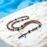 Chapelet avec grains en œil de tigre Ø 8 mm avec croix en hématite. Longueur jusqu'au cœur 31 cm