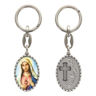 Porte-clés en aluminium de couleur argenté hauteur 3,8 cm, avec résine. Disponible avec plusieurs saints au choix.