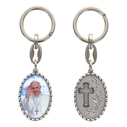 Porte-clés en aluminium de couleur argenté hauteur 3,8 cm, avec résine. Disponible avec plusieurs saints au choix.