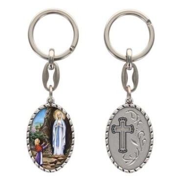 Porte-clés en aluminium de couleur argenté hauteur 3,8 cm, avec résine. Disponible avec plusieurs saints au choix.