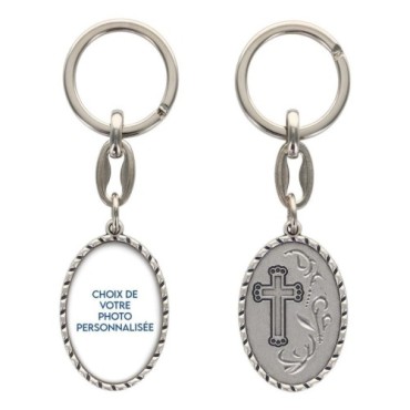 Porte-clés en aluminium de couleur argenté hauteur 3,8 cm, avec résine. Disponible avec plusieurs saints au choix.